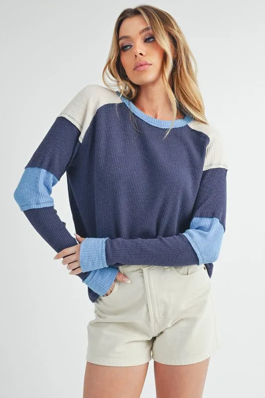 Aemi   Co Raw Seam Color Block Round Neck Knit Top