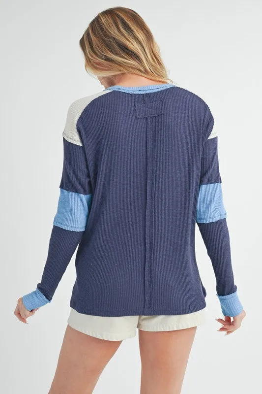 Aemi   Co Raw Seam Color Block Round Neck Knit Top