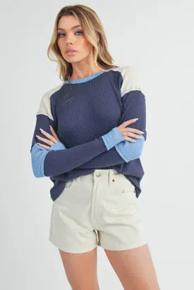 Aemi   Co Raw Seam Color Block Round Neck Knit Top