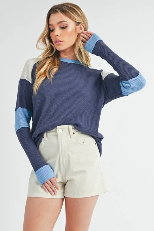 Aemi   Co Raw Seam Color Block Round Neck Knit Top