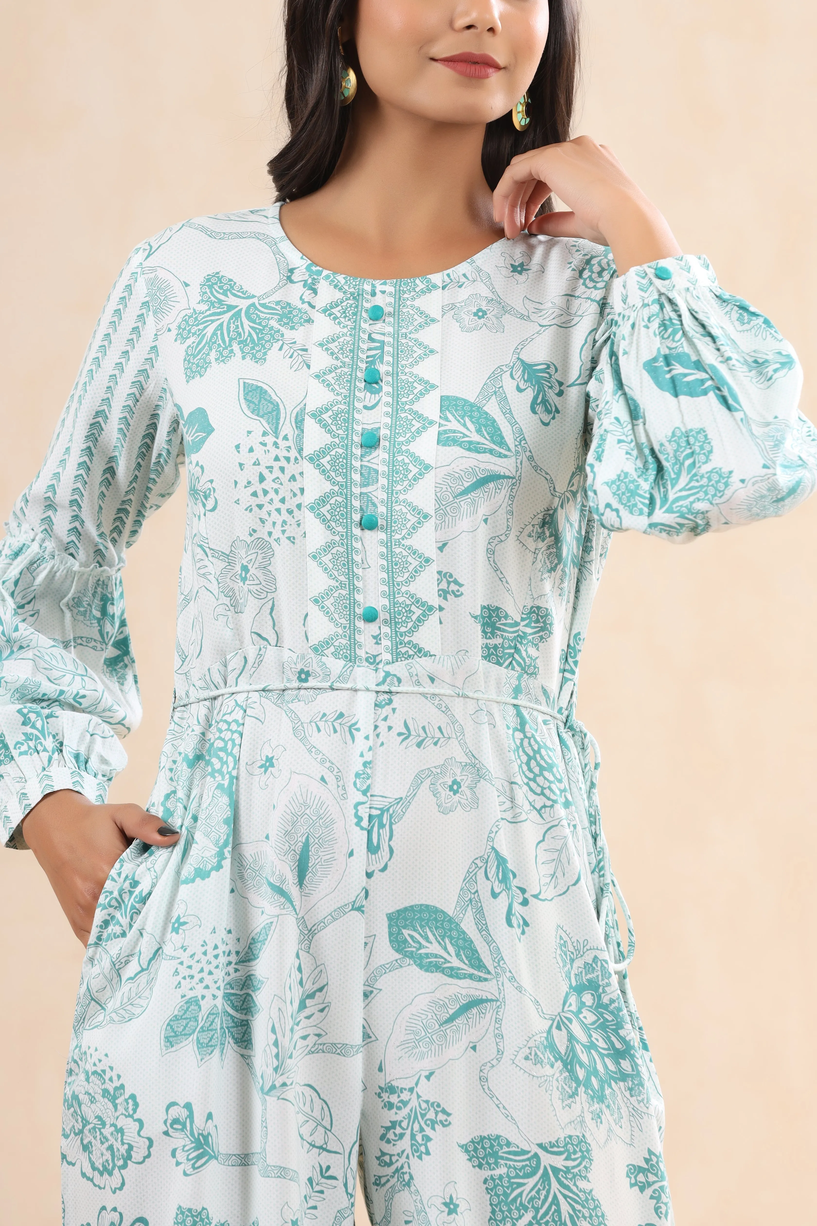 Juniper Teal Floral Printed Rayon Flared Jumpsuit.