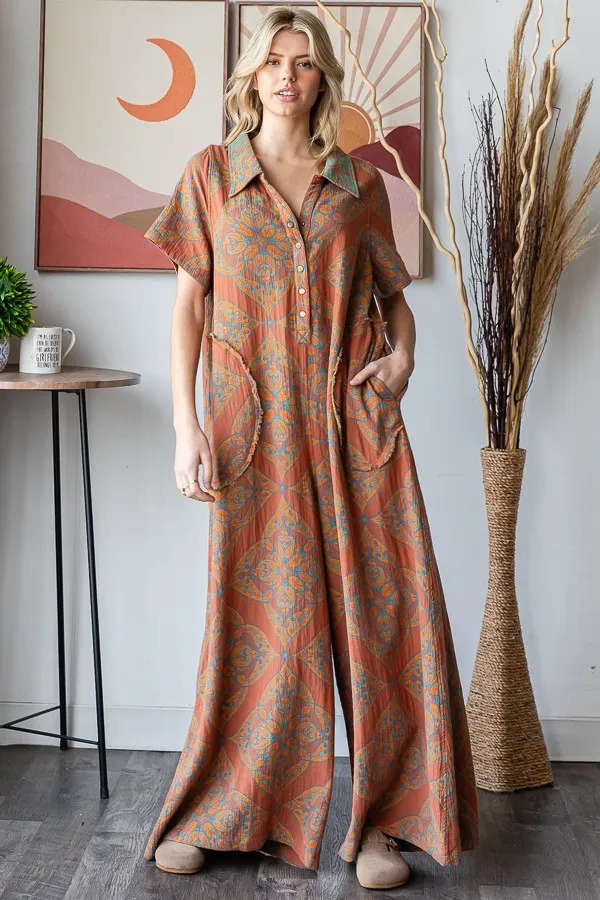 Oli & Hali Mixed Print Reversible Jumpsuit in Teal Rust